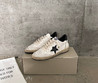 Женские кожаные кроссовки Golden Goose 2023-2024 белые с черной звездой