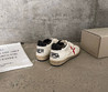 Женские кожаные кроссовки Golden Goose 2023-2024 белые с черным и красной звездой