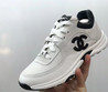 Женские комбинированные кроссовки Chanel 2023-2024 белые с черным логотипом