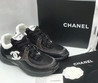 Женские комбинированные кроссовки Chanel 2023-2024 черные с коричневым и белым логотипом