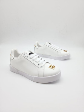 Женские кожаные кеды Dolce & Gabbana 2023 белые с золотым логотипом