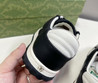 Женские комбинированные кроссовки Gucci 2023 черные с белым