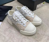 Женские текстильные кроссовки Chanel 2023 белые с бежевым