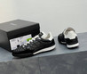 Женские кожаные кроссовки Chanel 2023 черные с белым