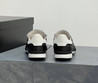 Женские кожаные кроссовки Chanel 2023 черные с белым