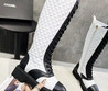 Женские кожаные сапоги Chanel 2023 черные с белым на шнурках