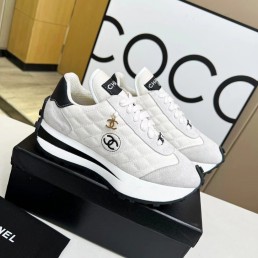 Женские комбинированные кроссовки Chanel 2023 белые с черным