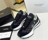 Женские комбинированные кроссовки Chanel 2023 черные с белой отстрочкой