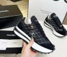 Женские комбинированные кроссовки Chanel 2023 черные с белой отстрочкой