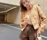 Женский жакет Chanel 2023 золотой с брошью