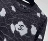 Женский шерстяной свитер Chanel 2023 черный с белым принтом