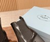 Женские кожаные сапоги Prada 2023 черные на каблуке