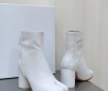 Женские кожаные ботильоны Maison Margiela 2023 белые на каблуке