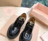 Женские кожаные лоферы Miu Miu 2023 черные на шнурках