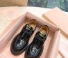 Женские кожаные лоферы Miu Miu 2023 черные на шнурках