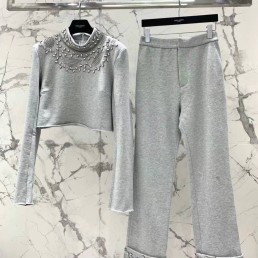 Женский трикотажный костюм Saint Laurent 2023 со стразами серый