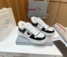 Мужские кожаные кроссовки на меху Prada 2023 белые с черным