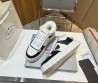 Мужские кожаные кроссовки на меху Prada 2023 белые с черным
