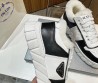 Мужские кожаные кроссовки на меху Prada 2023 белые с черным