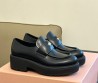 Женские кожаные лоферы Miu Miu 2023 черные на толстой подошве