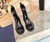 Женские кожаные сапоги Prada 2023 черные лакированные