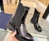 Женские кожаные сапоги Prada 2023 черные лакированные