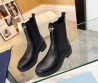 Женские кожаные сапоги Prada 2023 черные матовые
