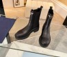 Женские кожаные сапоги Prada 2023 черные матовые