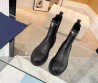 Женские кожаные сапоги Prada 2023 черные матовые