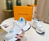 Женские комбинированные кроссовки Louis Vuitton 2023 белые с серым и голубым