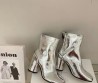 Женские кожаные ботильоны Maison Margiela 2023 серебристые