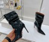 Женские укороченные кожаные сапоги Amina Muaddi 2023 черные лакированные