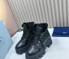 Женские кожаные ботинки на меху Prada 2023 черные