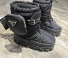 Женские луноходы Prada 2023 черные с накладным карманом