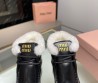 Женские кожаные ботинки Miu Miu 2023 с мехом черные