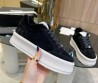 Женские замшевые кроссовки Chanel 2023 черные с мехом
