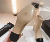 Женские кожаные сапоги Chanel 2024 бежевые с черным носком