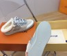 Женские комбинированные кроссовки Louis Vuitton 2023 серые с мехом