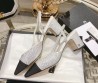 Женские кожаные туфли Chanel 2024 белые в стразах с черным носом