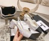 Женские кожаные туфли Chanel 2024 белые в стразах с черным носом