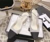 Женские кожаные туфли Chanel 2024 белые в стразах с черным носом