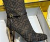 Женские текстильные сапоги на каблуке Fendi 2023 коричневые с принтом