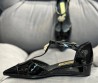Женские кожаные туфли Chanel 2023 черные лакированные на танкетке