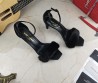 Женские кожаные босоножки Saint Laurent 2023 черные с мехом