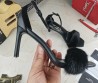Женские кожаные босоножки Saint Laurent 2023 черные с мехом