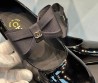 Женские кожаные туфли Chanel 2023 черные лакированные с бантом