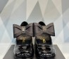 Женские кожаные туфли Chanel 2023 черные лакированные с бантом