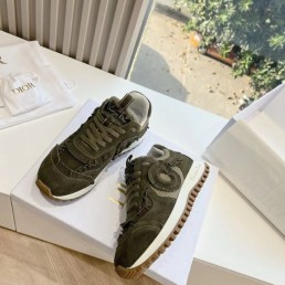 Женские замшевые кроссовки Christian Dior 2024 зеленые с бахромой