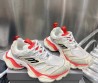 Женские комбинированные кроссовки Balenciaga 2023 серые с оранжевым