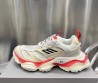 Женские комбинированные кроссовки Balenciaga 2023 серые с оранжевым